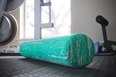 A foam roller will separate or loosen the fascia from the muscle...