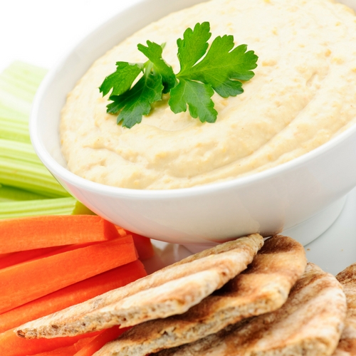 Hummus with Veggies - They’re high in fiber which helps slow the absorption of simple sugars